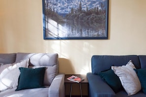Apartment, 3 Bedrooms | Living area | Flat-screen TV