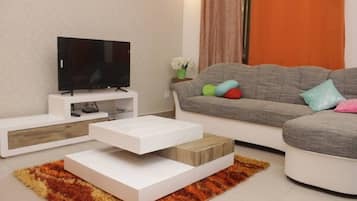 Apartemen, 2 kamar tidur | Area keluarga | TV layar datar