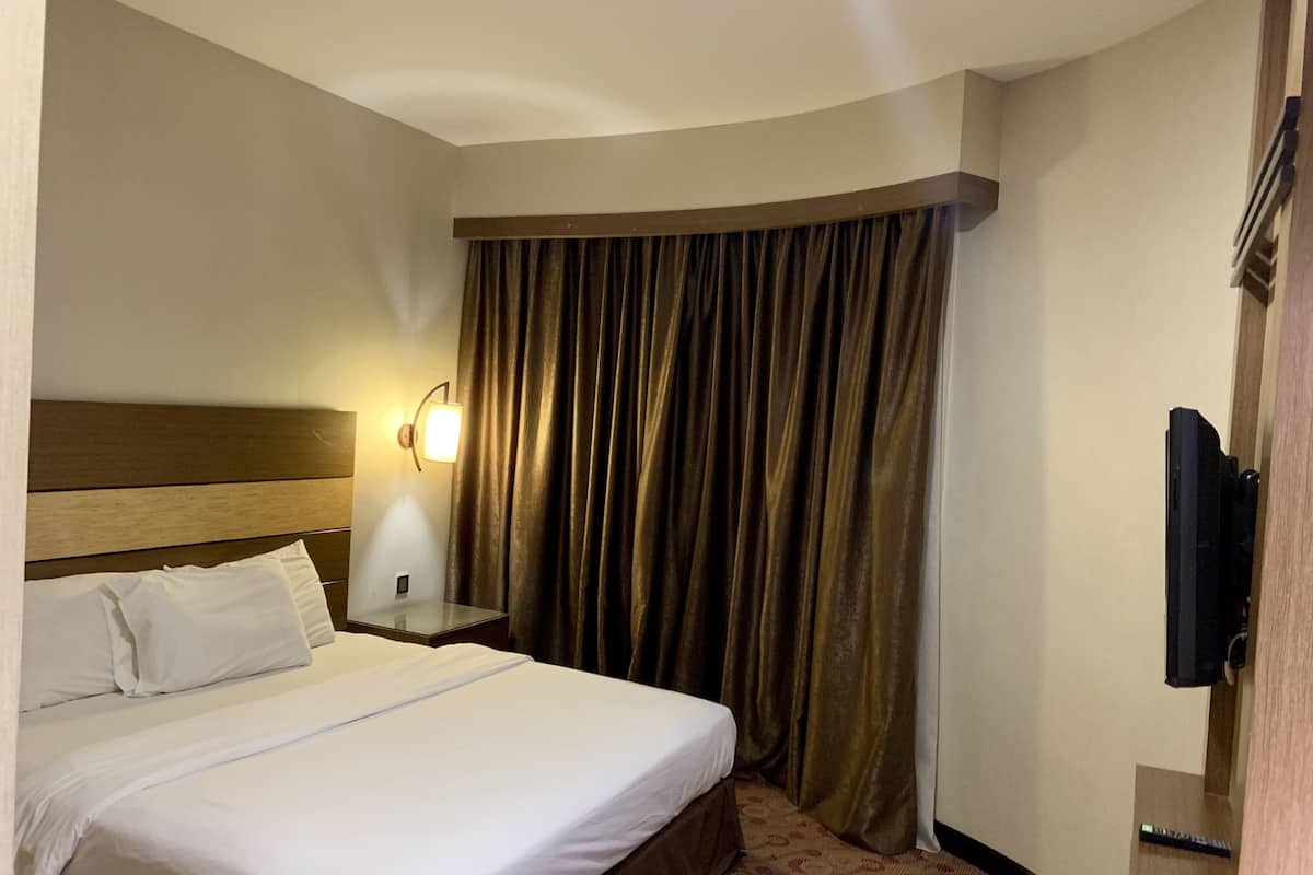Executive Room (with Living Room) | Desk, laptop workspace, iron/ironing board (on request), bed sheets