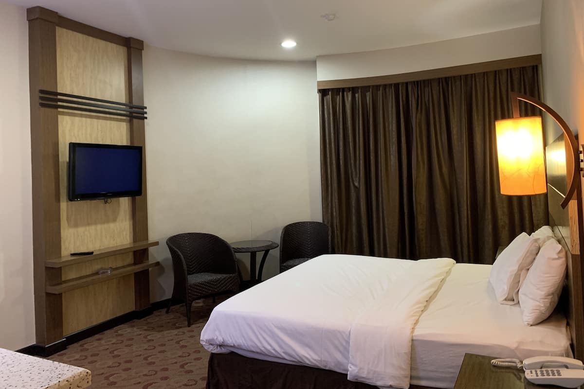 Executive Room (with Bathtub) | Desk, laptop workspace, iron/ironing board (on request), bed sheets