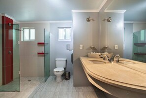 Shower, hair dryer, towels, toilet paper