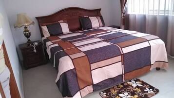 Blackout curtains, iron/ironing board, free WiFi, bed sheets