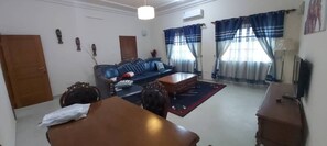 Apartment, 3 Bedrooms | Living area - yollande fidjrosse Apparts (Cotonou)