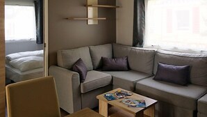 Mobile Home, 3 Bedrooms | Living area - Rev2Vacances - Camping Le Clos des Pins (Saint-Hilaire-de-Riez)