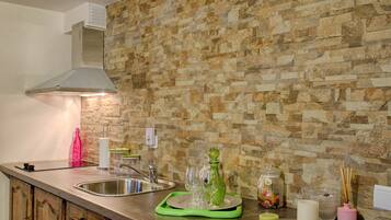 Apartment, 1 Bedroom | Private kitchen | Fridge, microwave, stovetop, coffee/tea maker