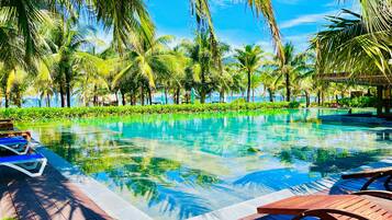 2 outdoor pools, pool umbrellas, pool loungers