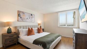 1 bedroom, desk, iron/ironing board, travel cot