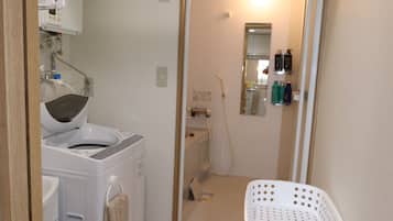 Combined shower/bathtub, hair dryer, towels, soap