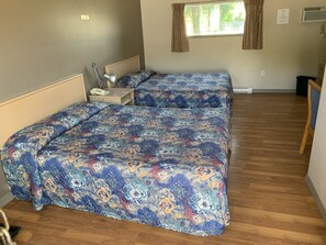 Deluxe Quadruple Room | Premium bedding, down comforters, Select Comfort beds, blackout drapes