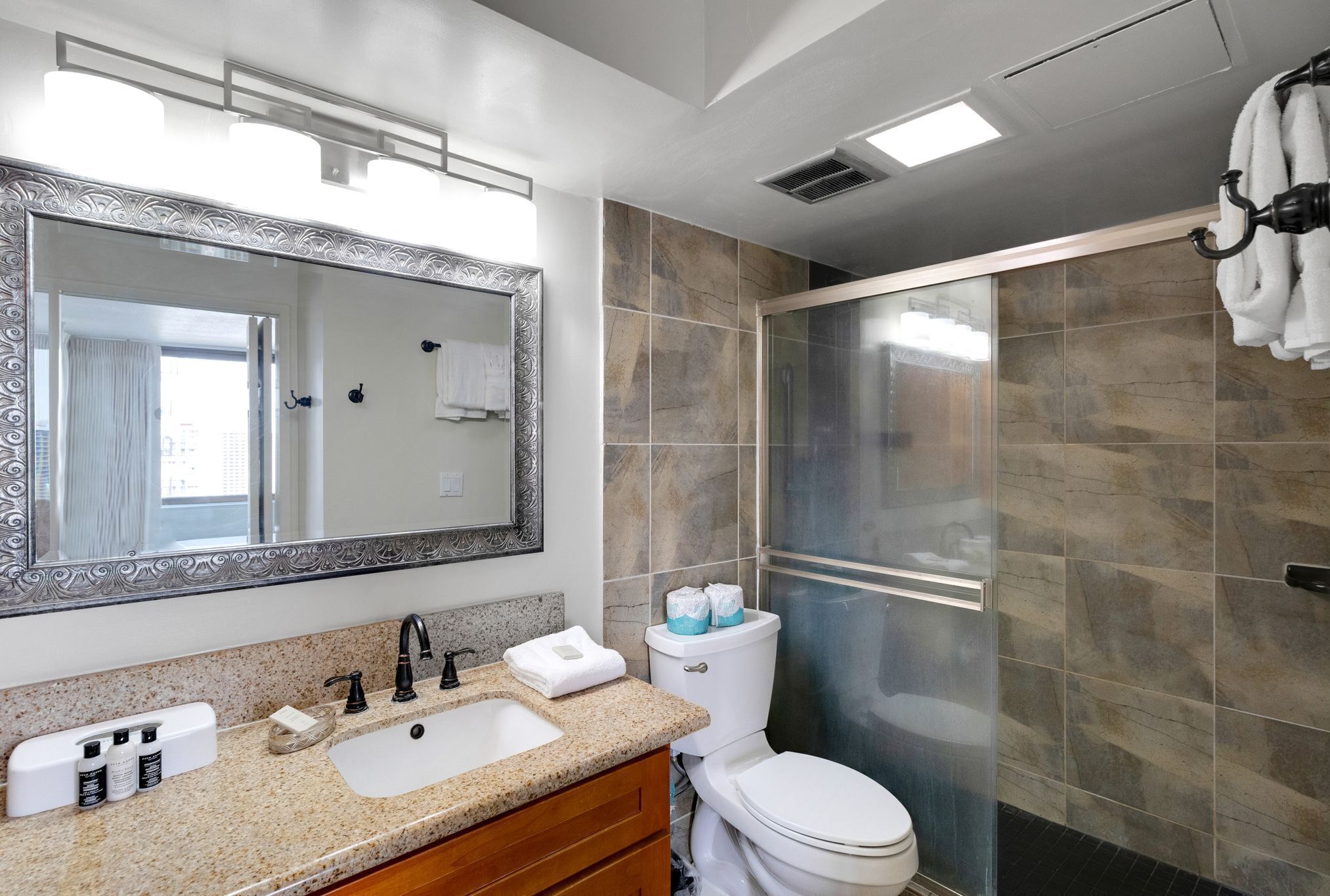 Shower, hair dryer, towels