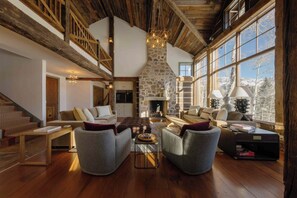 Smart TV, fireplace, books, stereo