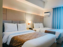 Deluxe Room, 2 Double Beds, Non Smoking, City View | Minibar, in-room safe, individually decorated, individually furnished