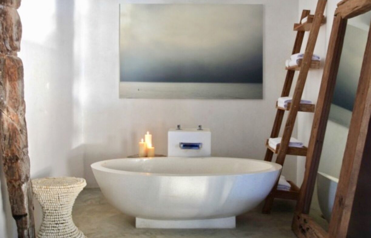 Bathtub, hair dryer, towels, soap