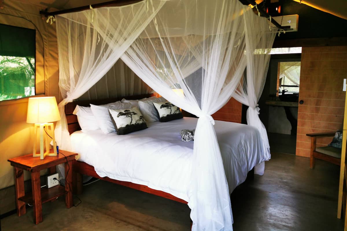 Luxury Tent, River View | Egyptian cotton sheets, premium bedding, down duvets, free WiFi