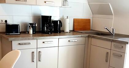 Chic top floor apartment with parking space