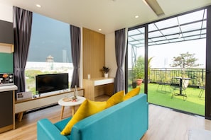 Premium Apartment, Terrace | Living area | 40-inch LCD TV with digital channels, TV