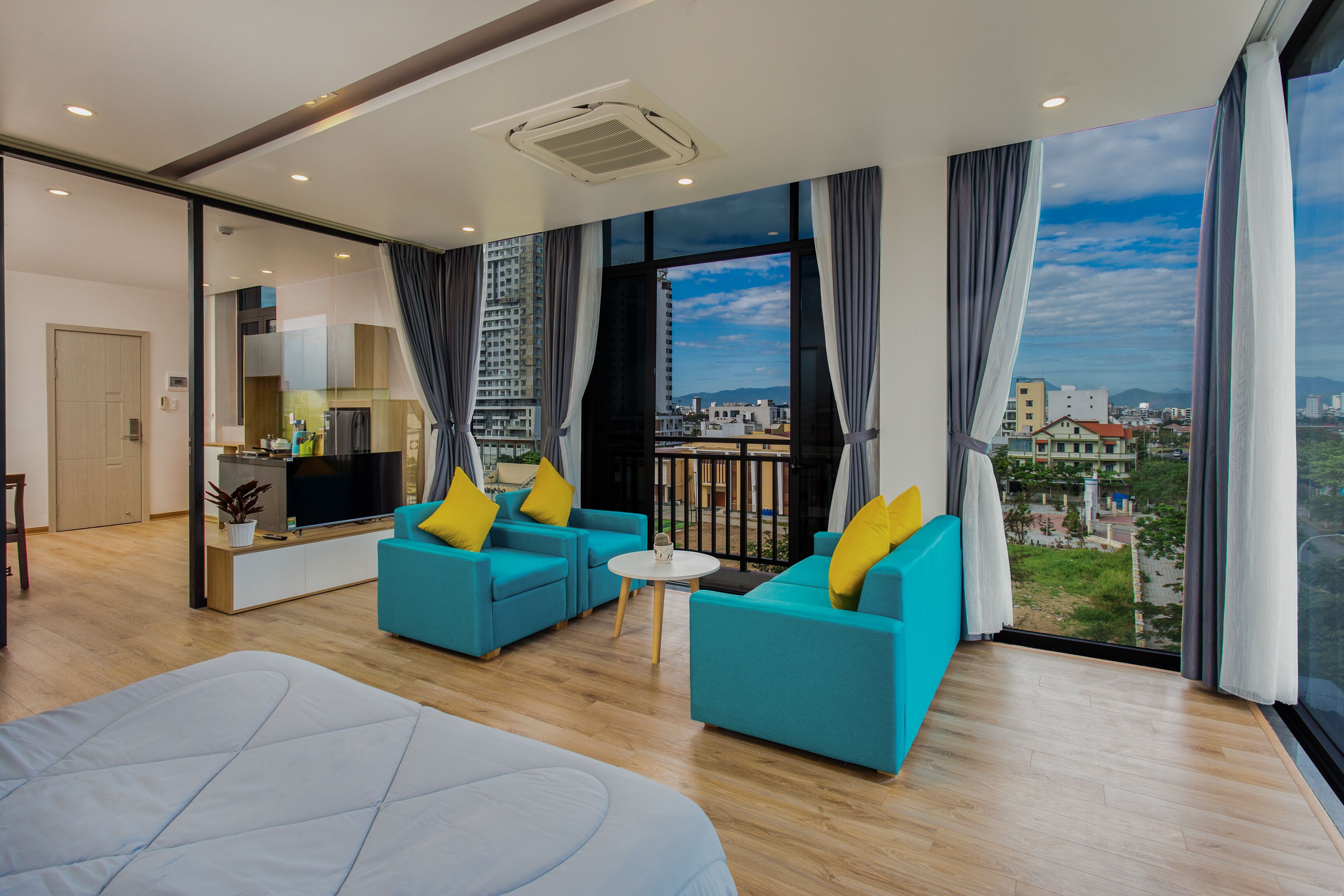 Signature Apartment, River View | Living room | 40-inch LCD TV with digital channels, TV