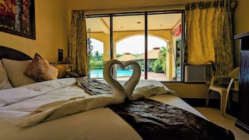 Elite Room, 1 Queen Bed, Non Smoking, Pool View | In-room safe, individually decorated, individually furnished
