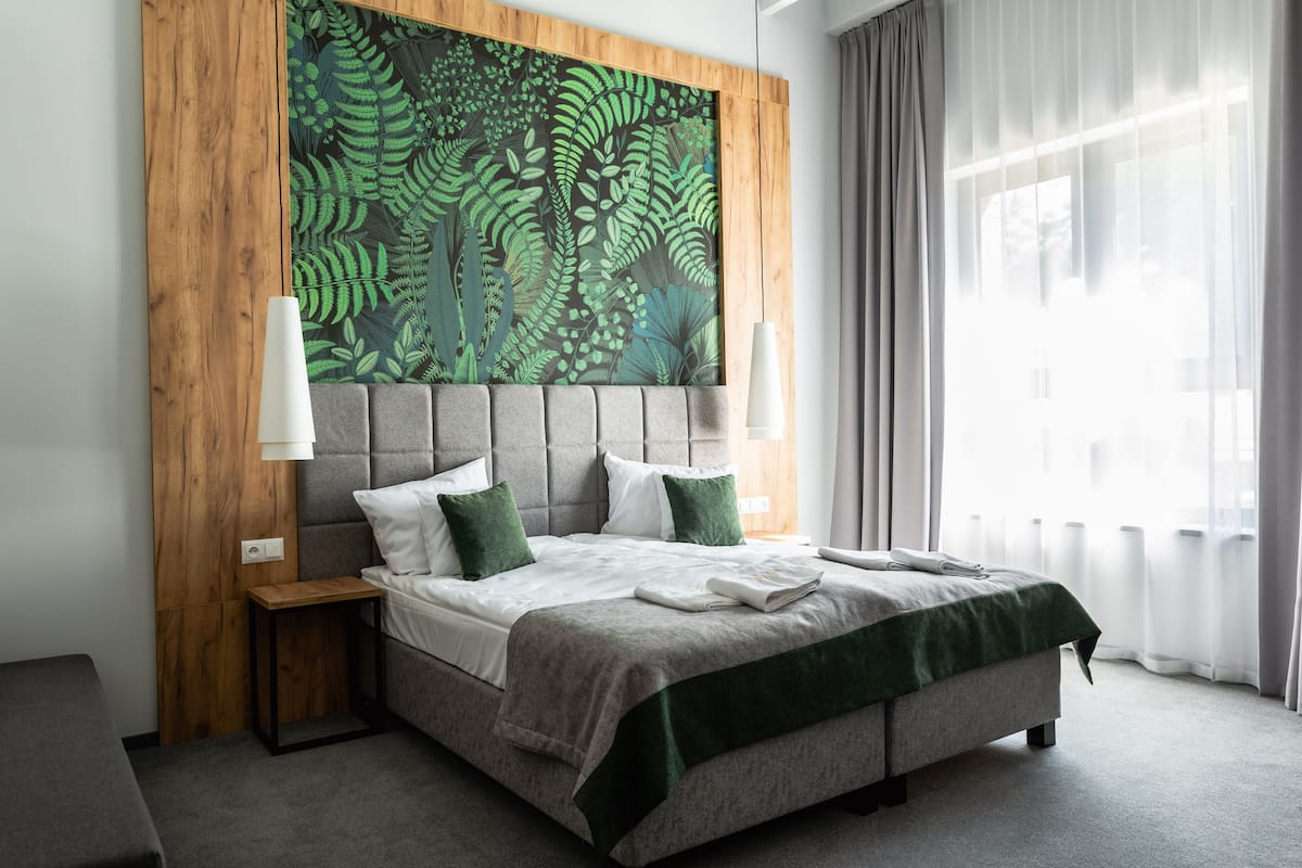 superior double room (lux) | living area | flat-screen tv