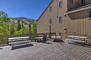 Enjoy a meal on the deck with a view of the surrounding mountains.