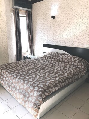 Desk, blackout drapes, soundproofing, bed sheets