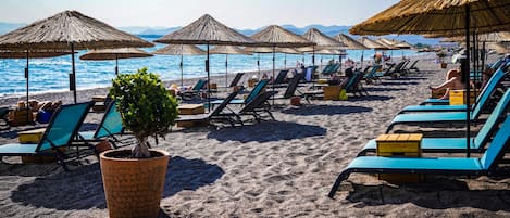 Private beach, sun loungers, beach umbrellas