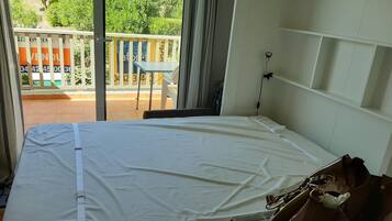 1 bedroom, iron/ironing board, travel cot, bed sheets