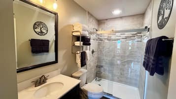 Hair dryer, towels, soap, shampoo