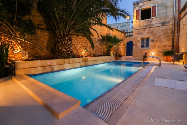 Outdoor pool, open 8:00 AM to 10:00 PM, sun loungers