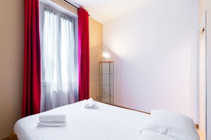 Apartment, 1 Bedroom | 1 bedroom, laptop workspace, blackout drapes, iron/ironing board