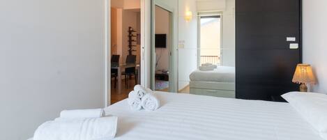 Apartment, 1 Bedroom | 1 bedroom, blackout drapes, iron/ironing board, free WiFi