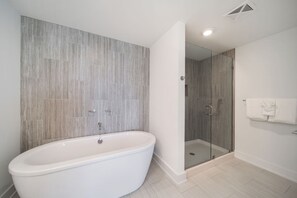 Bathtub, hair dryer, towels