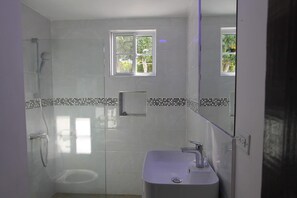 Condo, 2 Bedrooms | Bathroom | Shower, towels, soap, shampoo