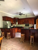 Fridge, oven, stovetop, cookware/dishes/utensils