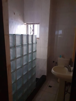 Shower, free toiletries, towels, soap