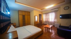 Minibar, desk, laptop workspace, blackout curtains