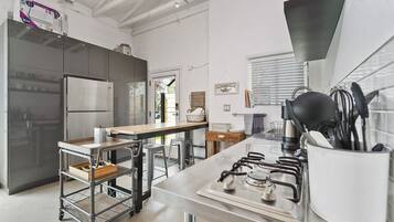 Fridge, microwave, stovetop, coffee/tea maker