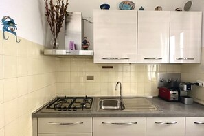 Fridge, oven, dining tables