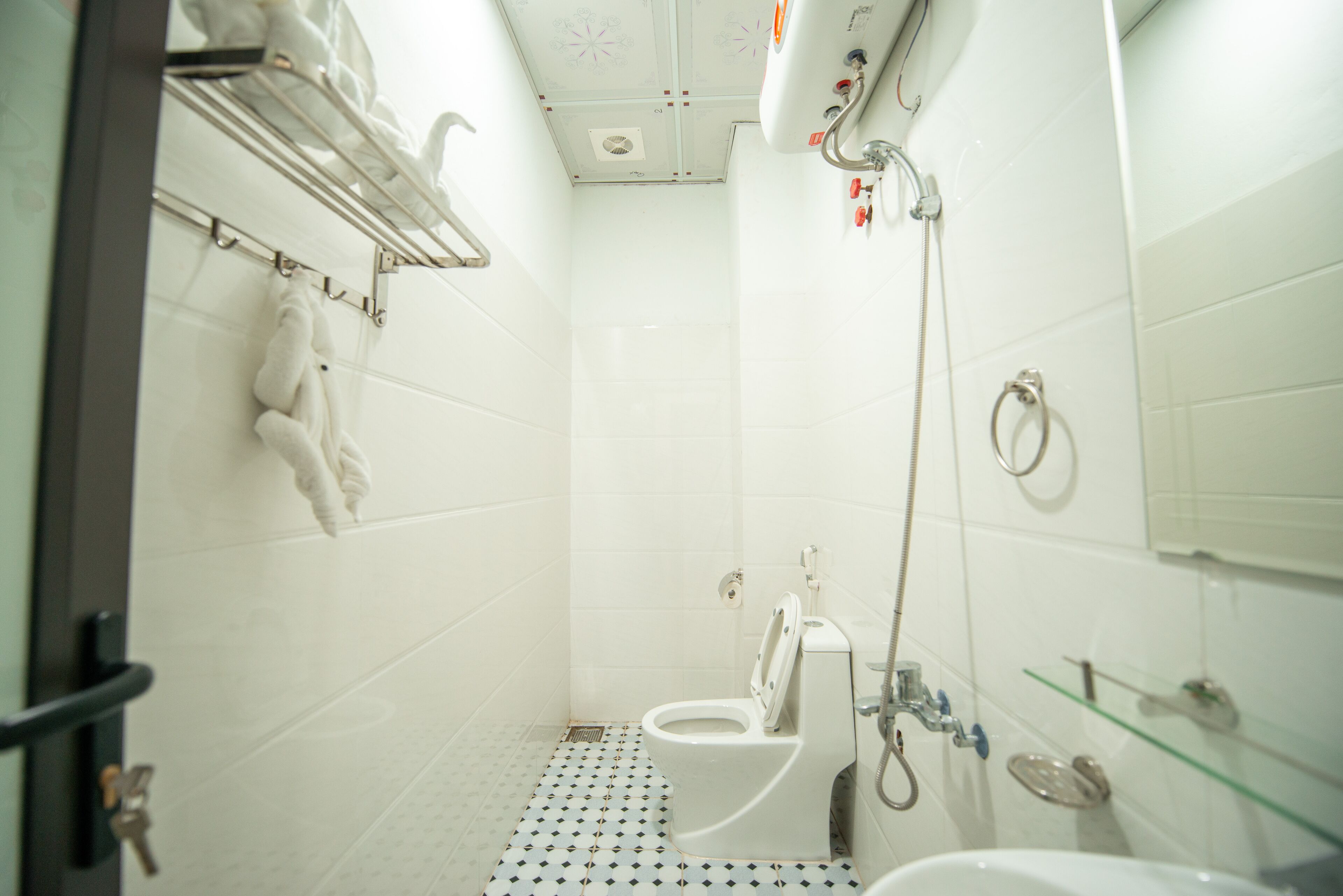 Shower, free toiletries, hair dryer, slippers