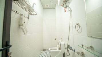 Shower, free toiletries, hair dryer, slippers