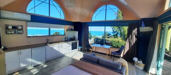 Oceanview Chalet with Floor-to-Ceiling Windows - Your Serene Escape.
