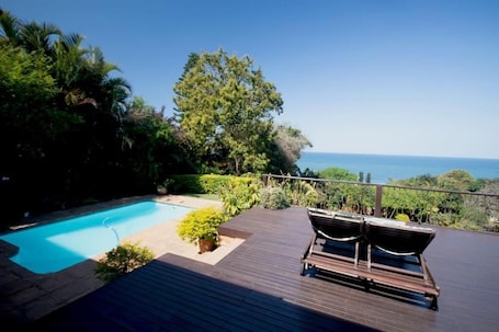 Family House, 5 Bedrooms, Ocean View, Garden Area | Premium bedding, in-room safe, individually decorated. Bare Feet Retreat