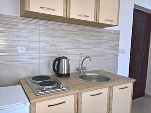 Appartement Deluxe, 1 chambre | Coin cuisine privé | Réfrigérateur, plaque de cuisson, bouilloire électrique