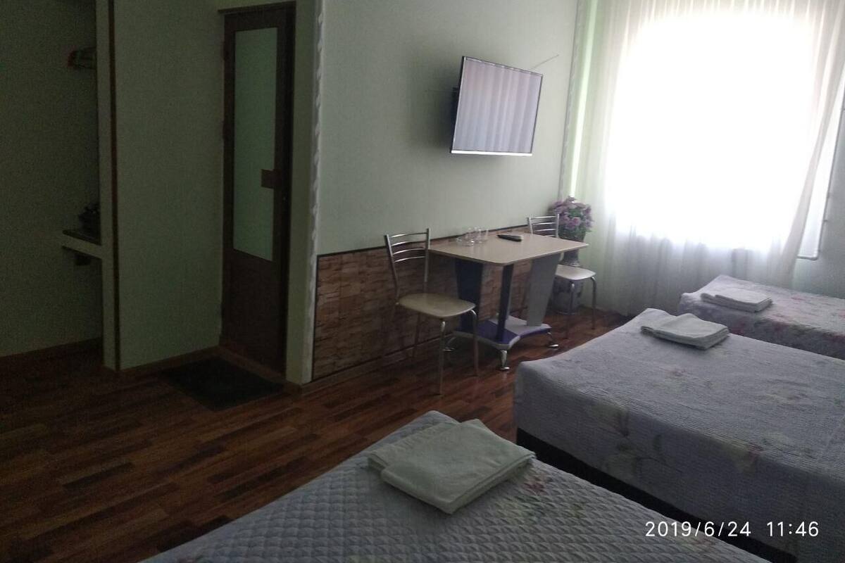 Business Triple Room | In-room safe, individually decorated, desk, blackout drapes