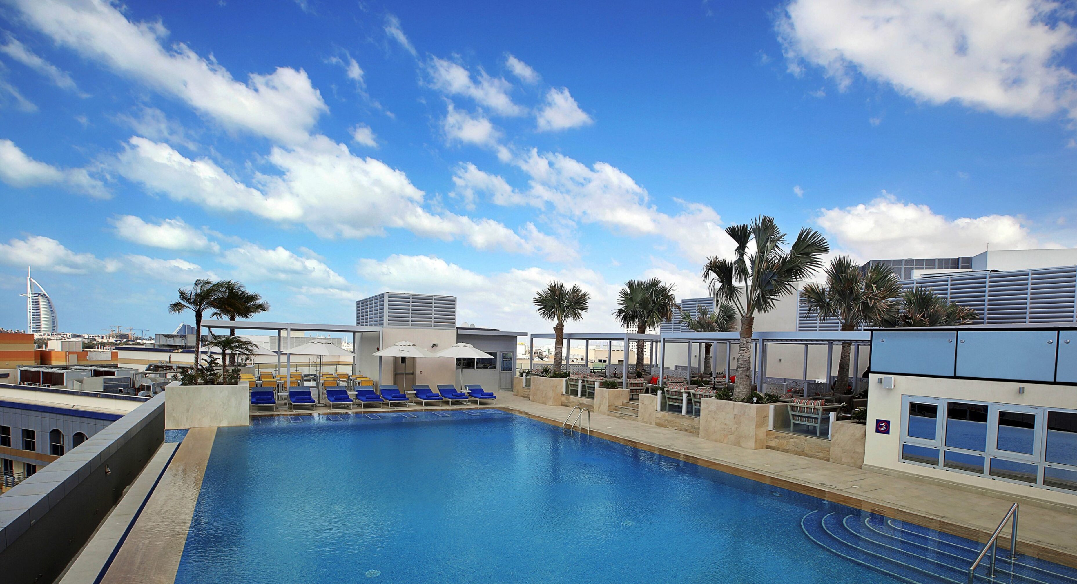 Outdoor pool, pool umbrellas, pool loungers