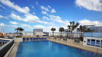 Outdoor pool, pool umbrellas, pool loungers