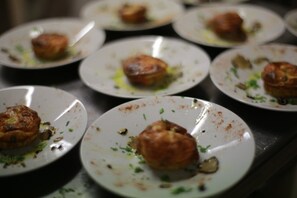 A series of plates with food remnants, suggesting a dining setting. - Agriturismo Il Fantone (Scansano)