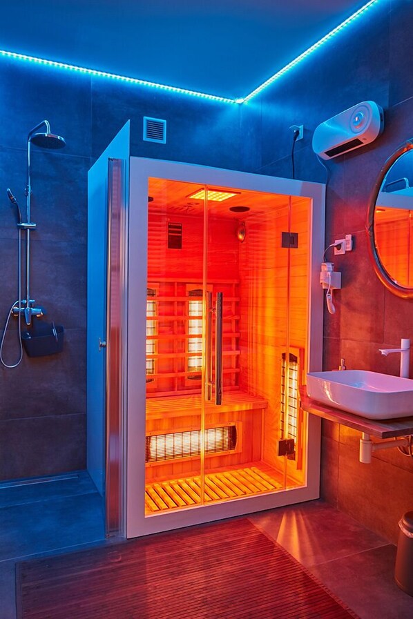 Shower, hair dryer, towels, soap