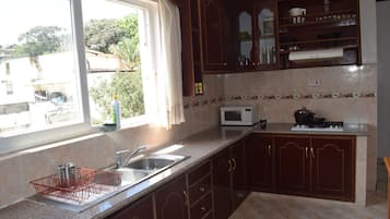 Apartment, 2 Bedrooms | Private kitchen | Fridge, microwave, oven, stovetop