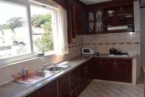 Apartment, 2 Bedrooms | Private kitchen | Fridge, microwave, oven, stovetop - Bustani Apartment (Mombasa)